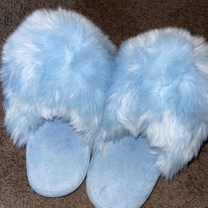 Blue fuzzy slippers
